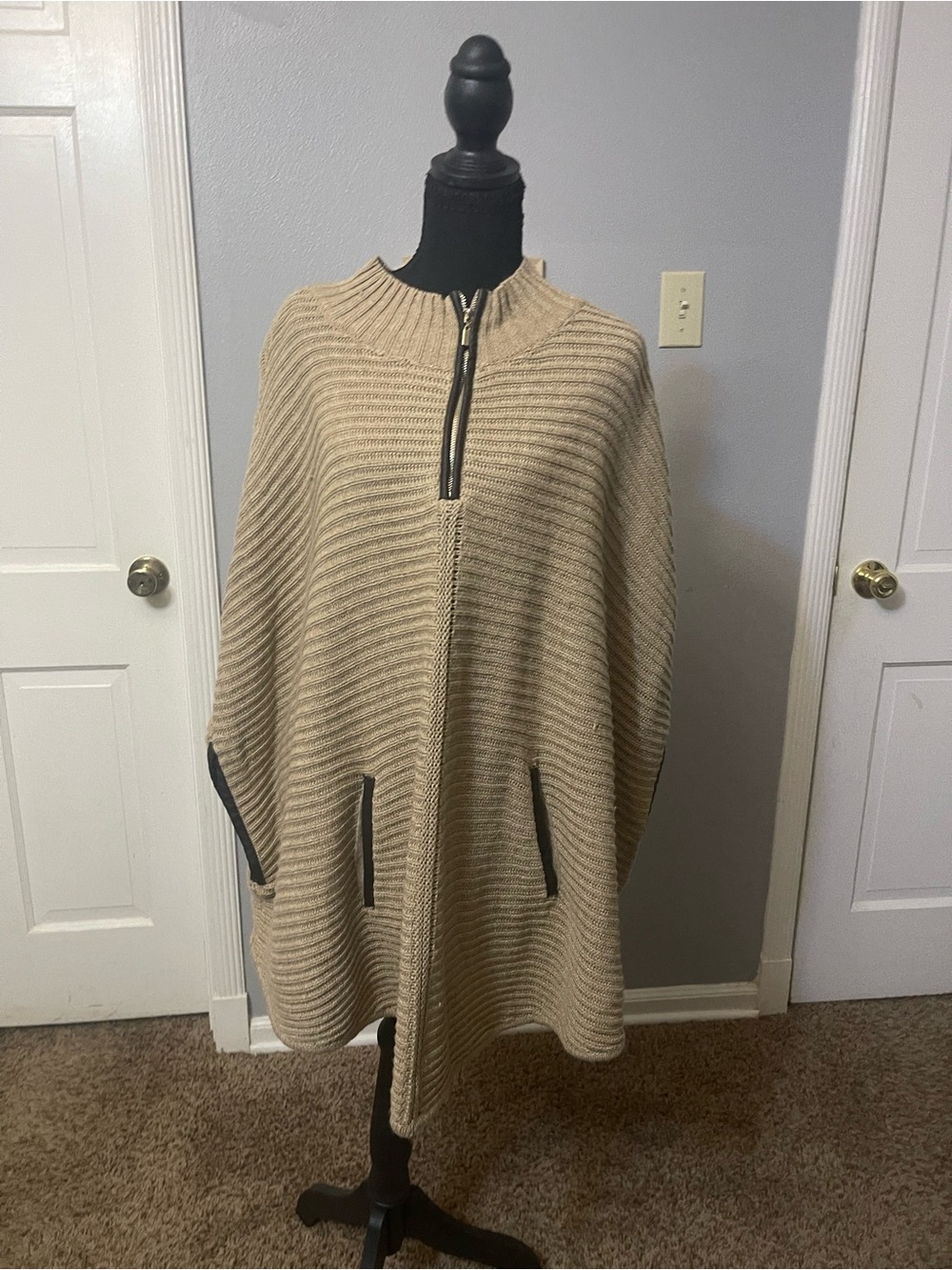 Tan and brown sweater poncho